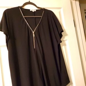 Black blouses with dazzle zipper.